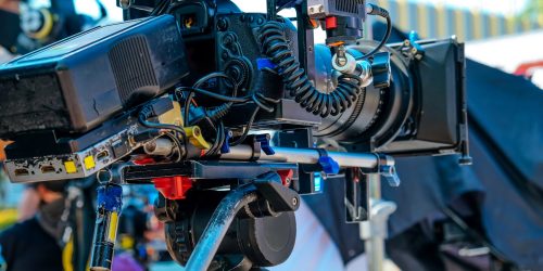 camera-on-film-set-behind-the-scenes-background-scaled-1.jpg