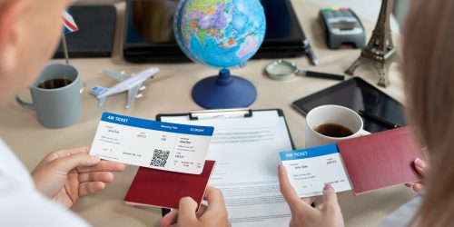close-up-of-passports-and-tickets-in-the-hands-of-travelers-at-a-travel-agency-scaled-1.jpg close-up-of-passports-and-tickets-in-the-hands-of-travelers-at-a-travel-agency-scaled-1.jpg
