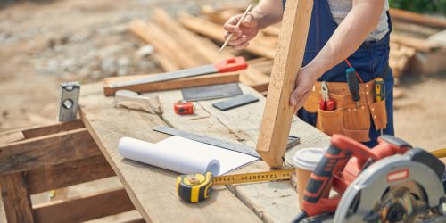 construction-worker-standing-in-front-of-the-table-outdoors-scaled-1.jpg construction-worker-standing-in-front-of-the-table-outdoors-scaled-1.jpg