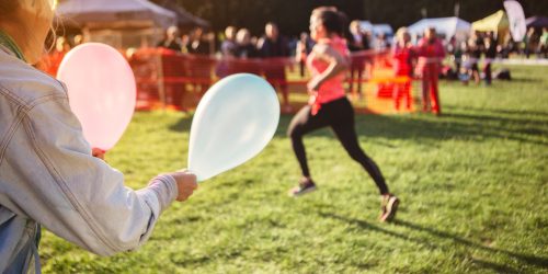 supporter-holding-balloons-at-sports-event-scaled-1.jpg supporter-holding-balloons-at-sports-event-scaled-1.jpg
